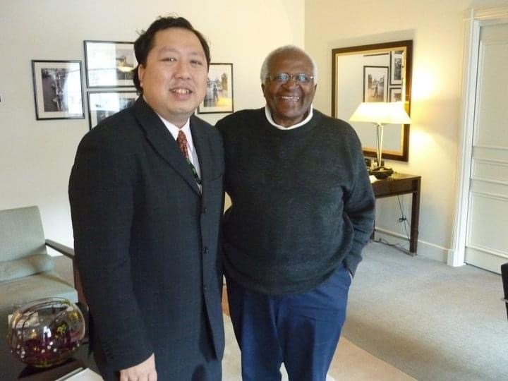 Andrew Khoo with Archbishop Tutu.